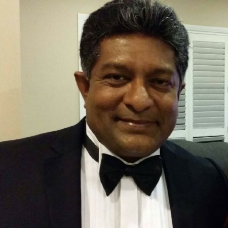 Dr Suharsha K